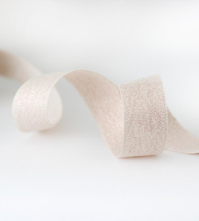 Metallic woven cotton ribbon 1 ½” width, roll of 44 yards Metallic woven cotton ribbon 1 ½” width, roll of 44 yards